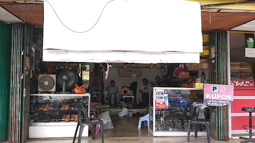 Kedai Membaiki Kasut Joe