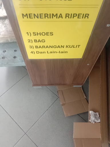 Tukang Kasut Man